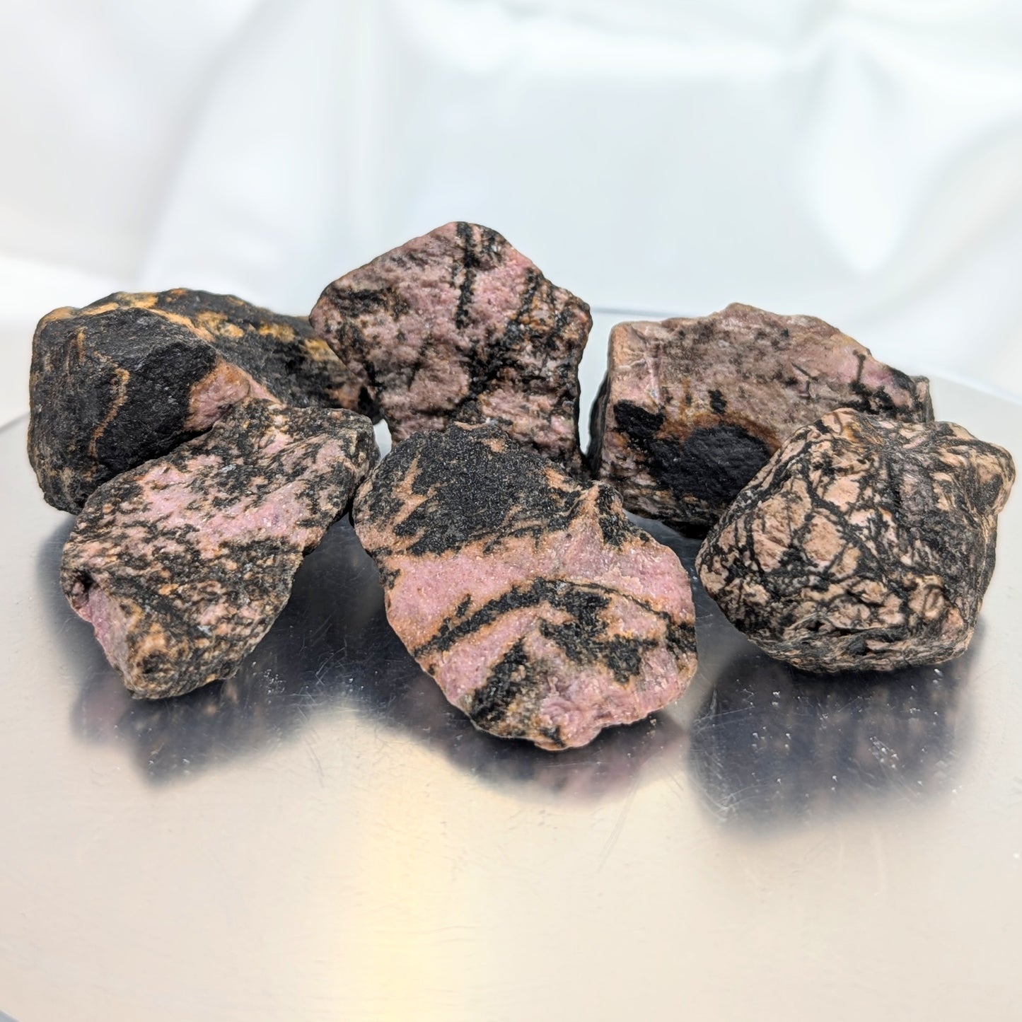 Rough Rhodonite Stone.