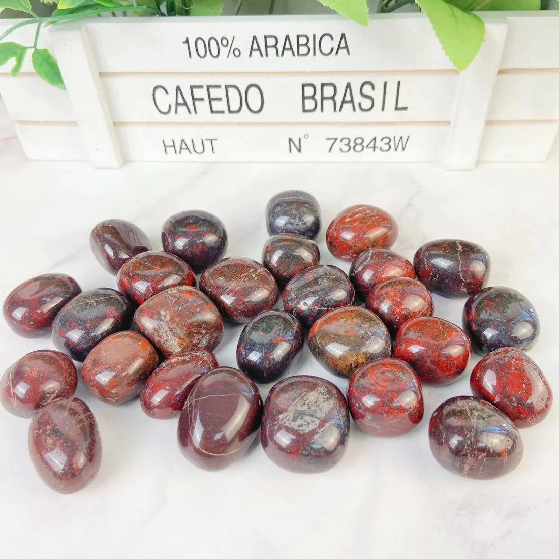 A handful of red Chinese Chicken Blood Crystal stones.