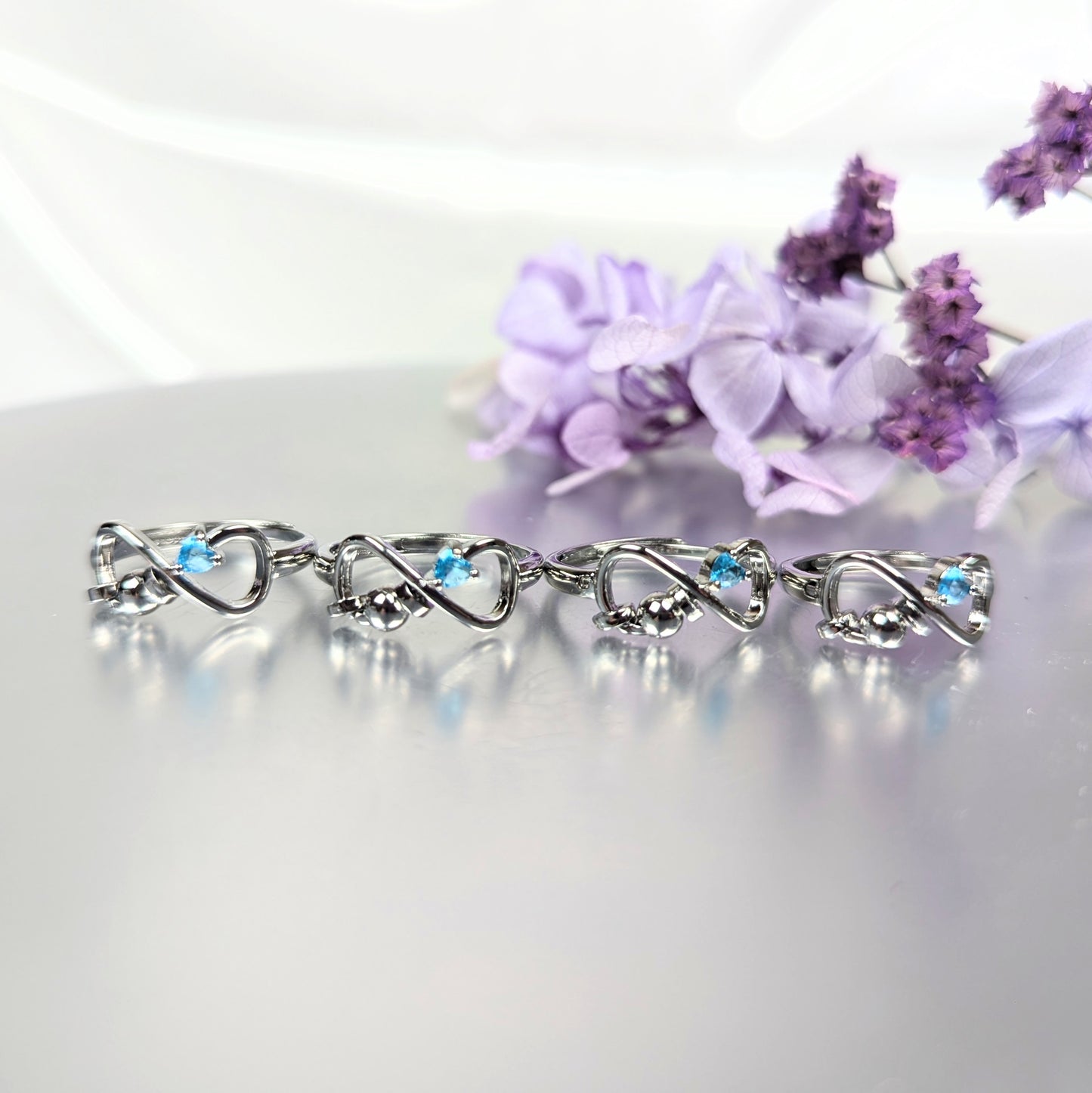 March Silver Plated Adjustable Infinity Birth Stone Ring (Synthetic)