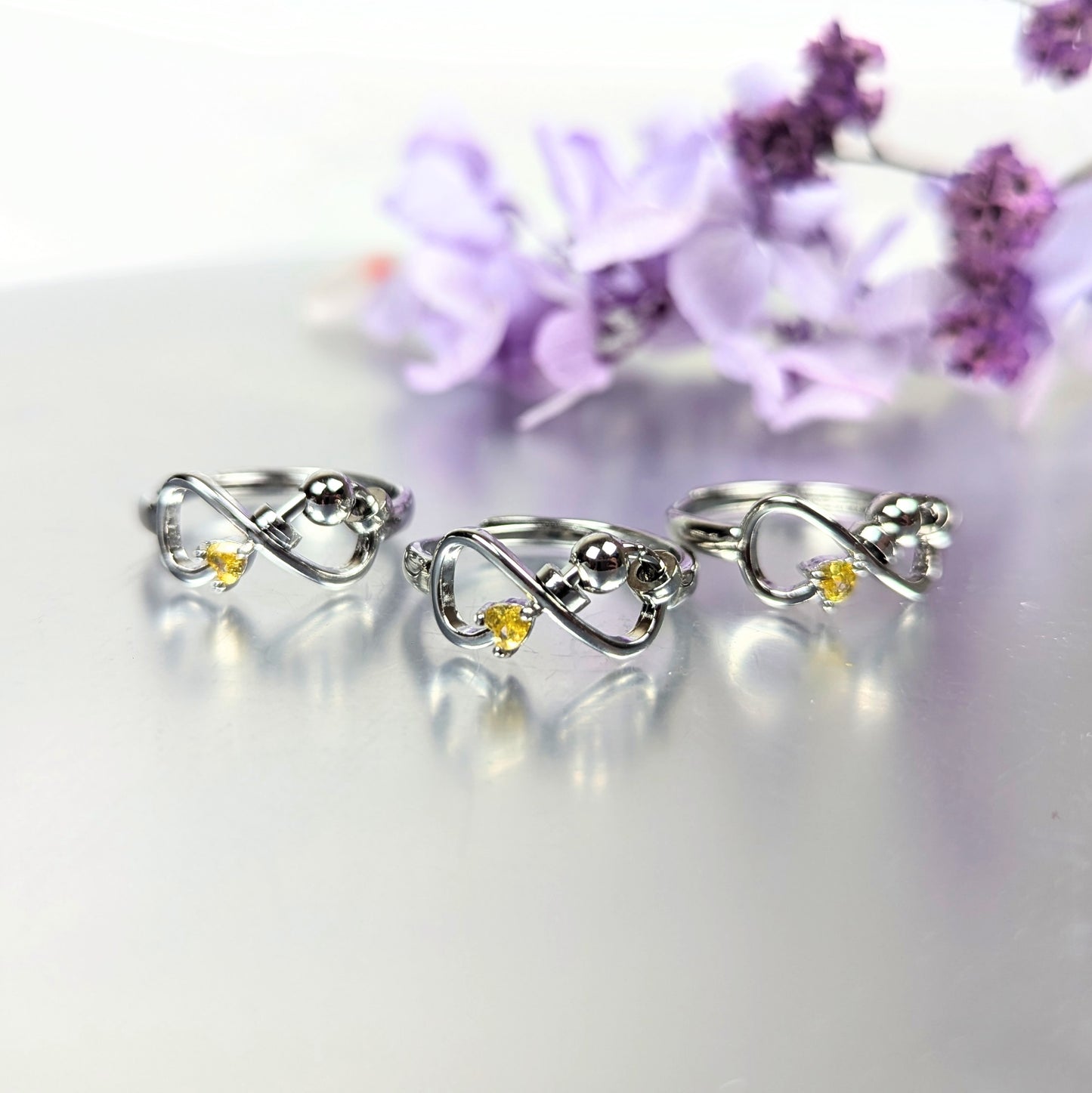 August Silver Plated Adjustable Infinity Birth Stone Ring (Synthetic)
