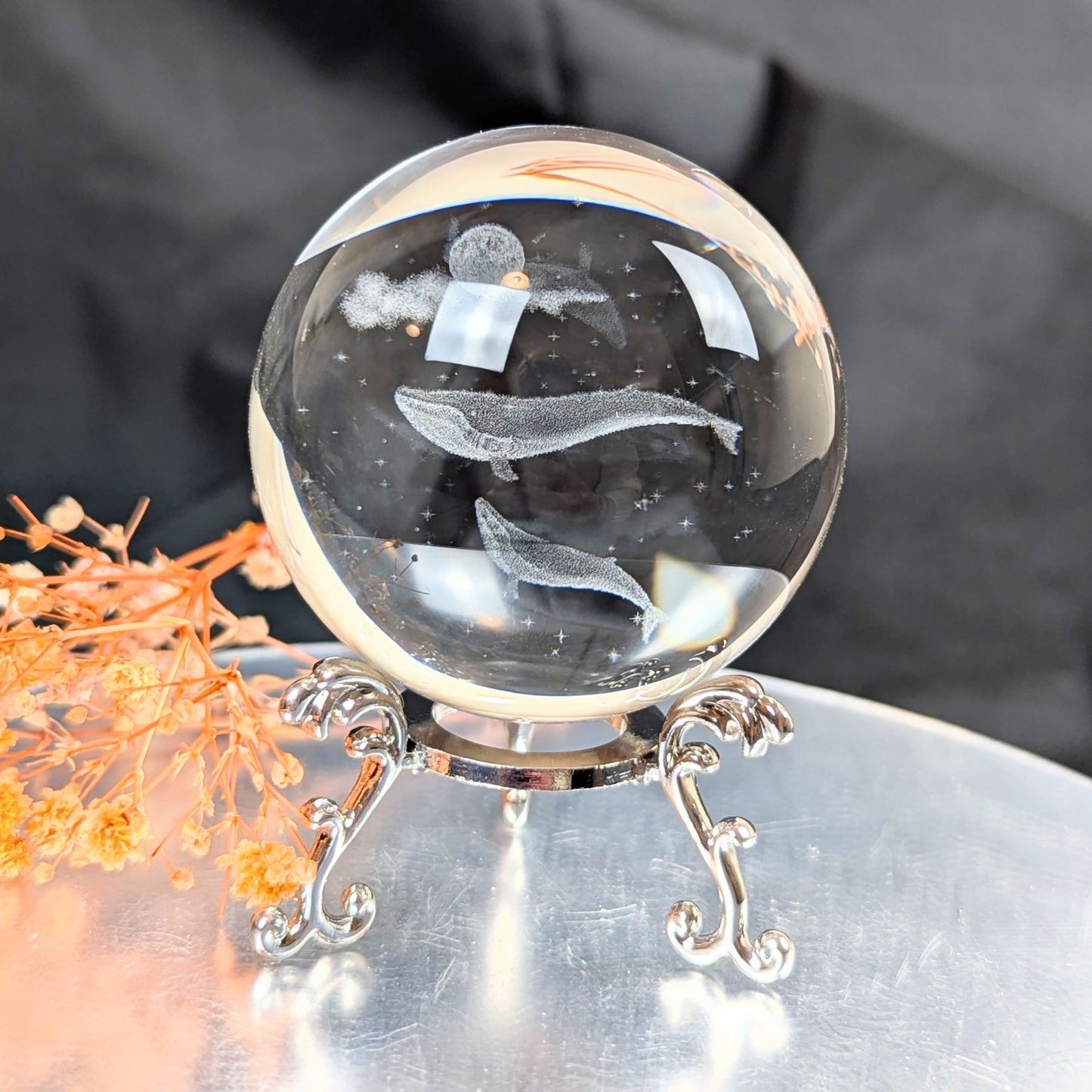 Whales in Glass Sphere