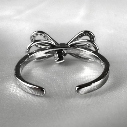 Silver Bow with Dangly Charm Ring