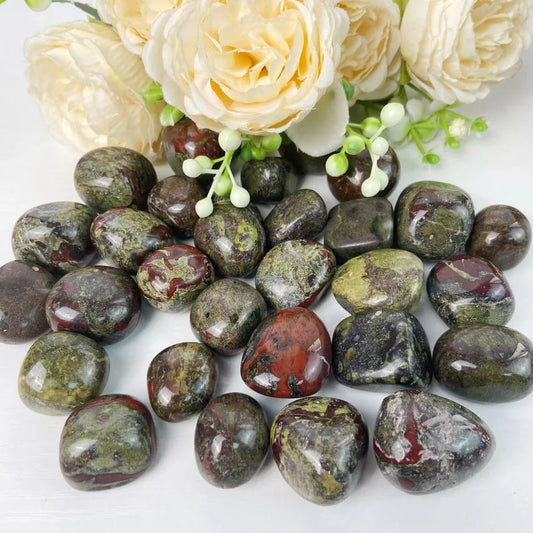 Dragon blood tumbled stones in conker brown with mossy green patches.