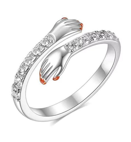 Diamanté Hug with Orange Nails Silver Plated Adjustable Ring