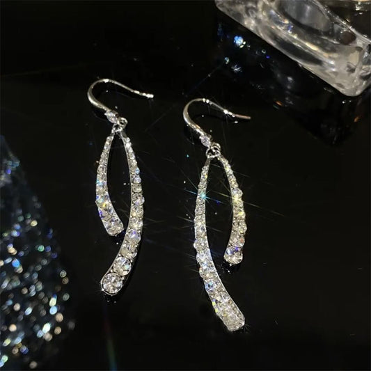 Foxy Zircon Curved Dangly Earrings - Silver Alloy